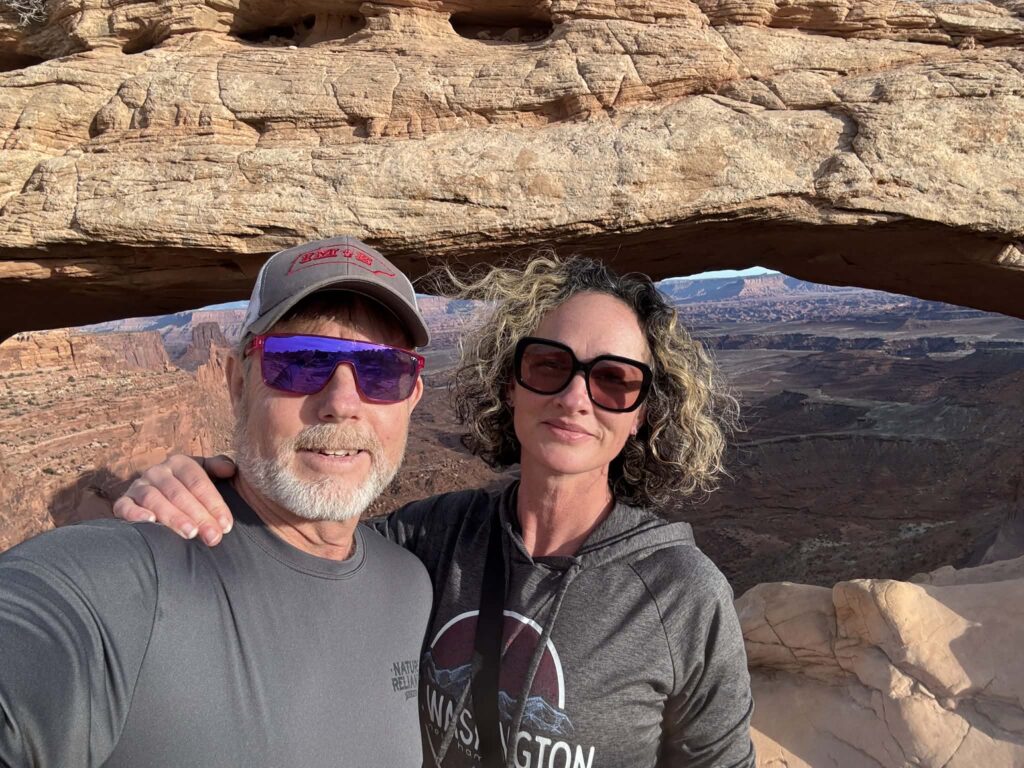 Two people under an arch