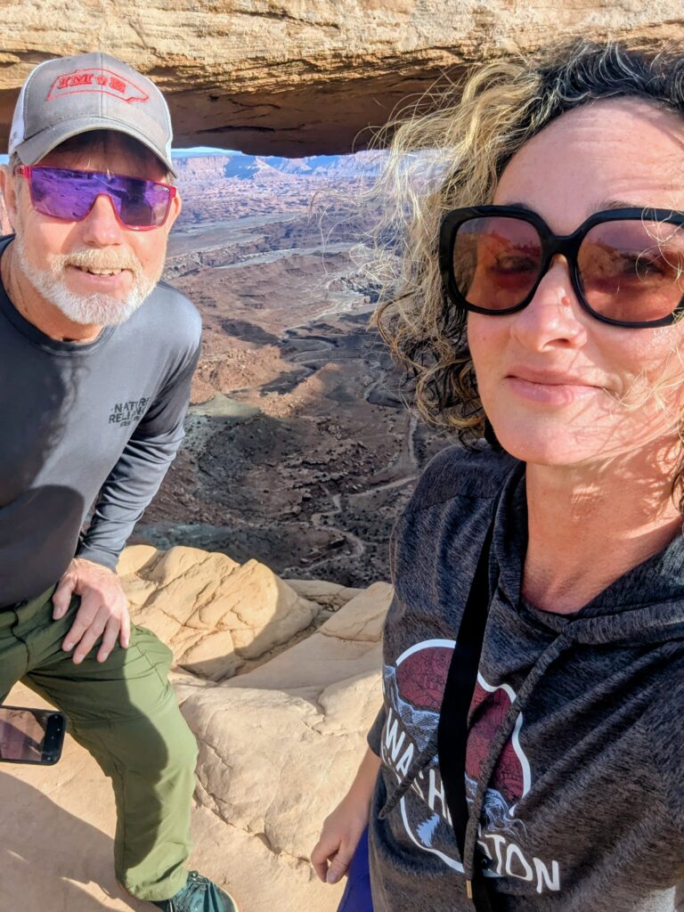 Two people under an arch